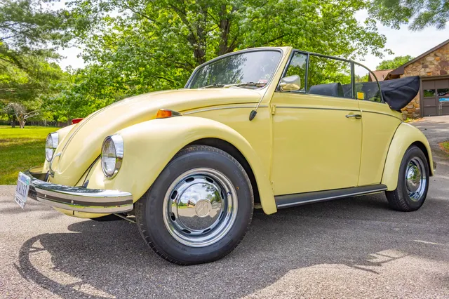 1969 Volkswagen Beetle — front quarter in the sun