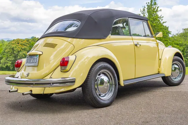 1969 Volkswagen Beetle — rear three-quarter view, top up