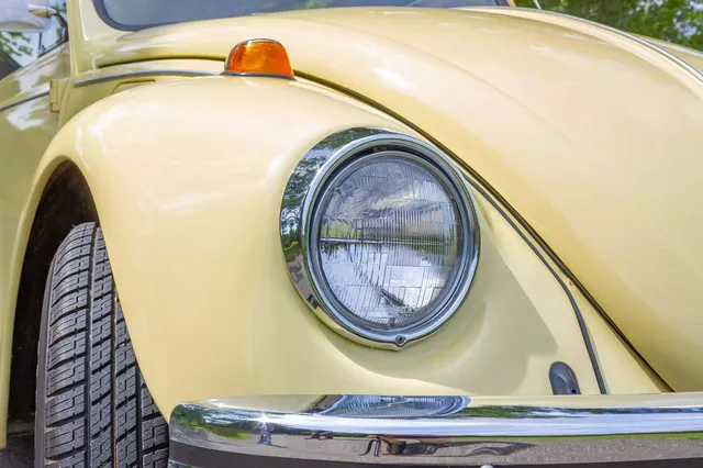 1969 Volkswagen Beetle — headlight and chrome detail