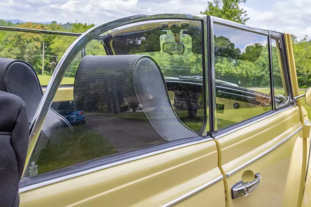 1969 Volkswagen Beetle — door glass and cabin