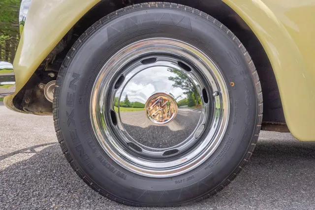 1969 Volkswagen Beetle — wheel and chrome hubcap