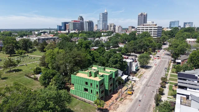 Wider aerial view toward the city skyline