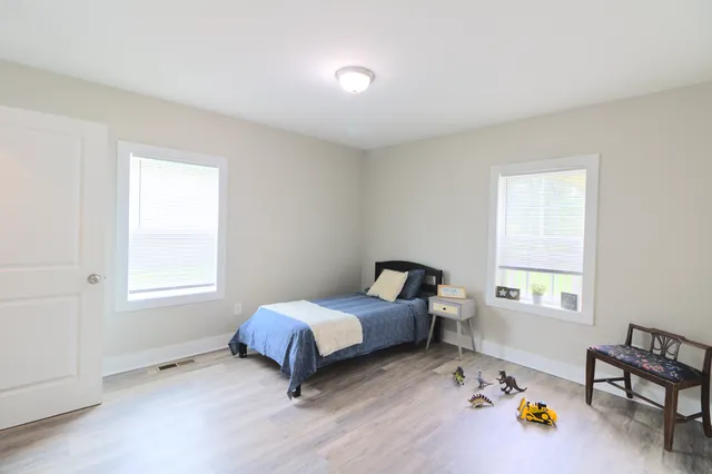 Bedroom with two windows
