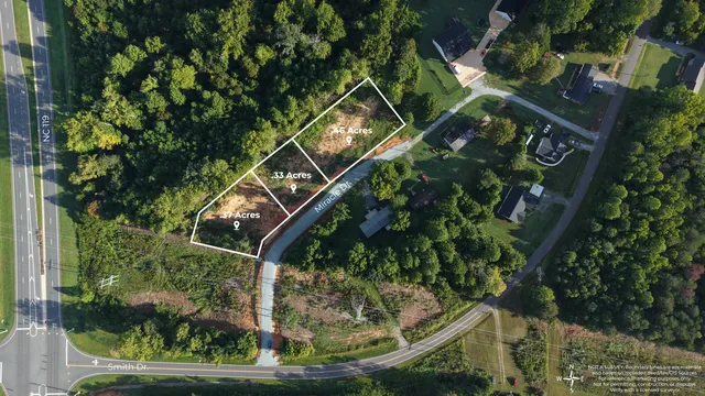 Overhead view of a corner parcel with an approximate outline