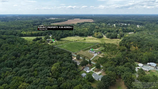 Aerial property context with a location marker