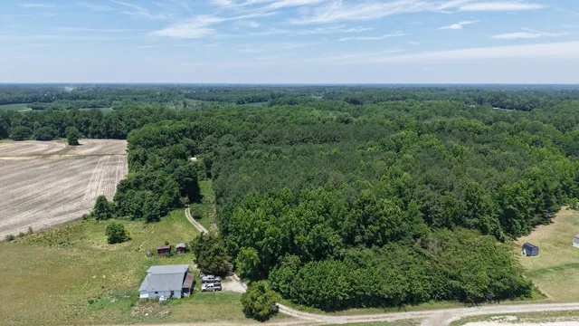 Lower aerial view across the property